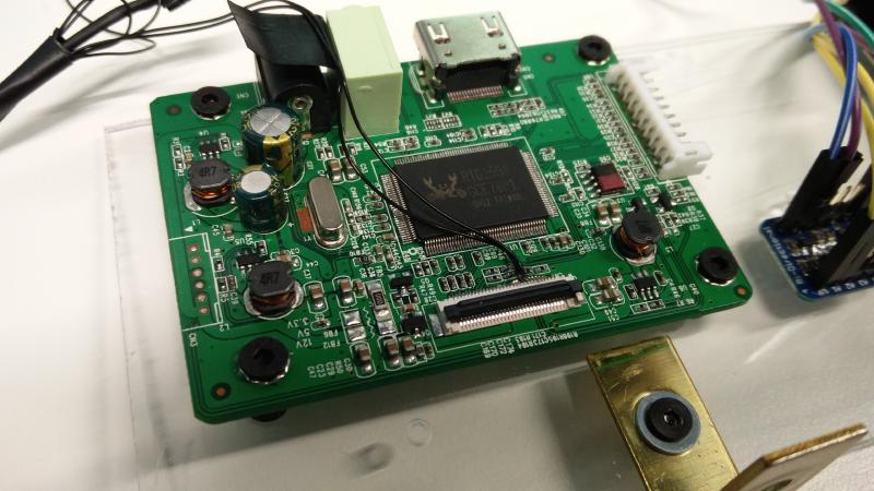 LCD controller with two additional wires soldered on