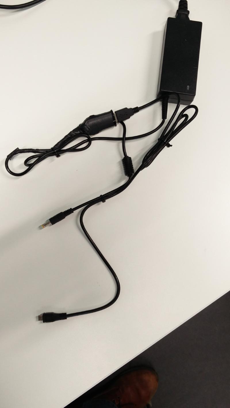 Wall power supply with USB power supply spliced in