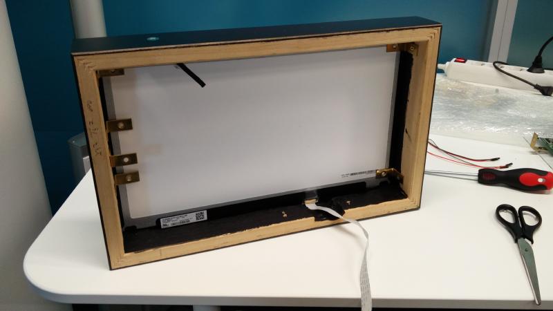 LCD panel mounted in picture frame as seen from the back