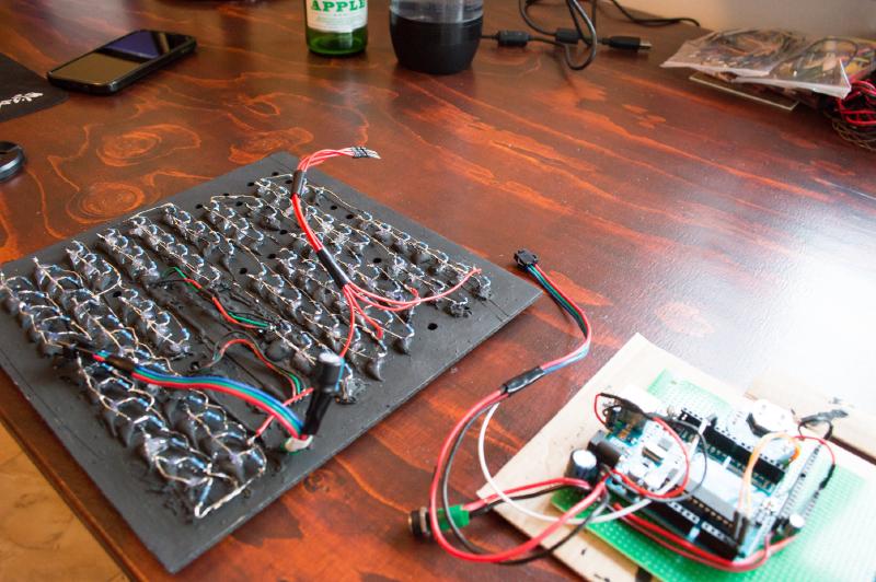 Wood panel with LEDs mounted and resistors attached