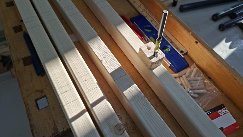Drilling dowel holes into legs