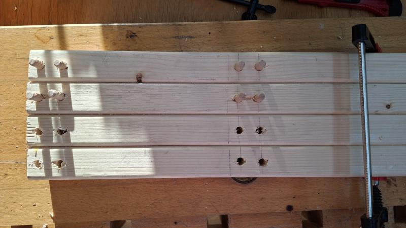 Holes in legs with wooden dowels