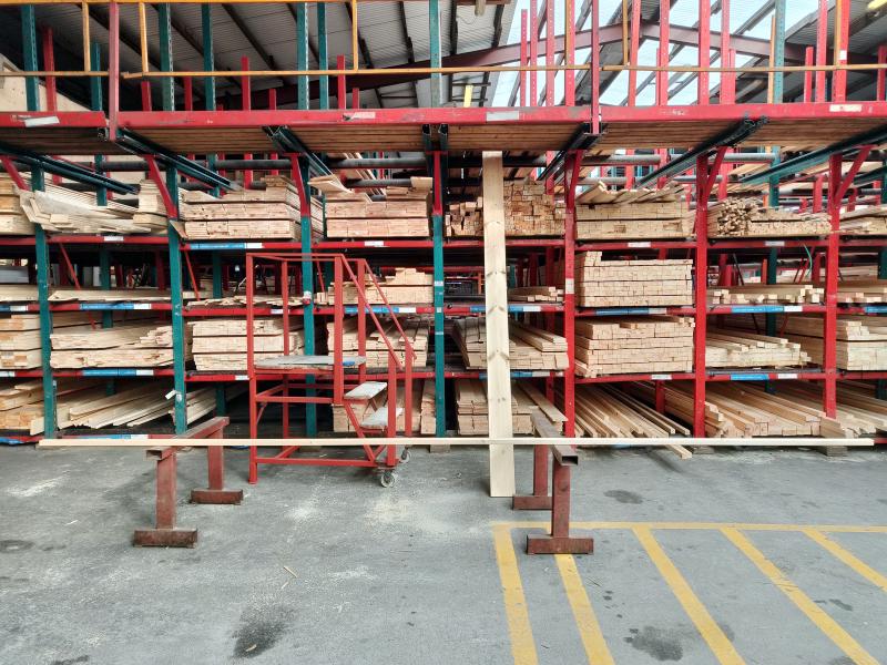 Planed lumber stacked in warehouse