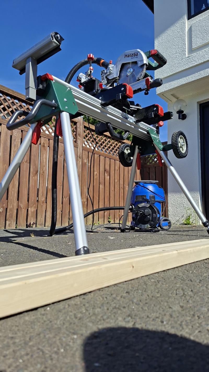 Saw and vacuum setup outside for cutting